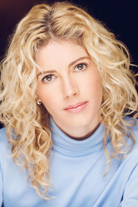 Megan Johnson as Woman in the Bathroom