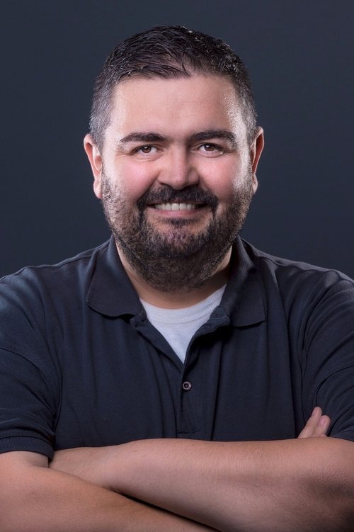 Fatmir Spahiu as Mr. Hasani