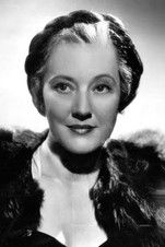 Dora Clement as Mrs. O'Rourke