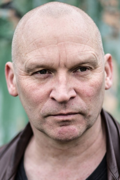 Ben Shockley as Father Cavill