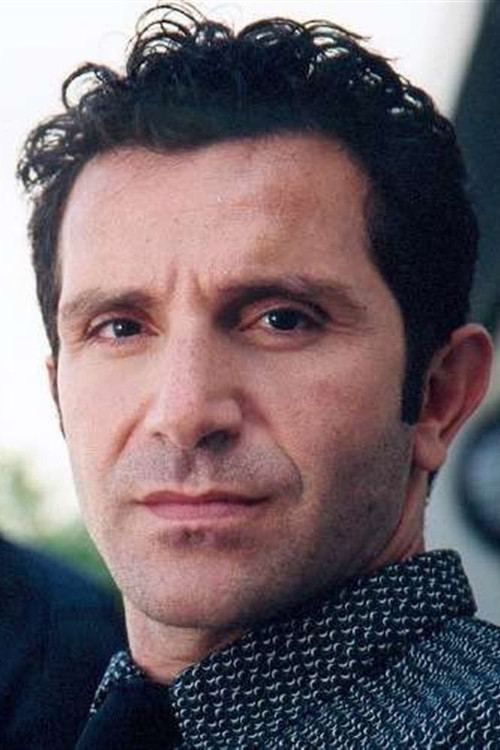 Emmanuel Quatra as Guitarist Zeng