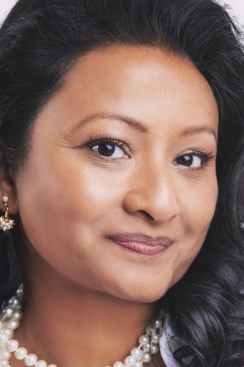 Joya Joseph as Restaurant Host