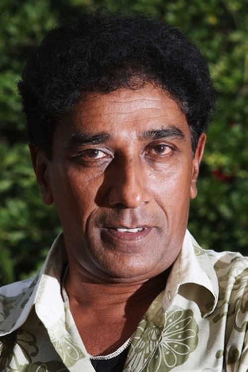 Mahendra Perera as 