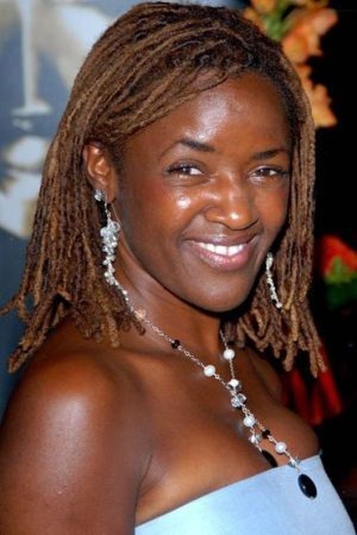 Diane-Louise Jordan as Chemist Shop Assistant