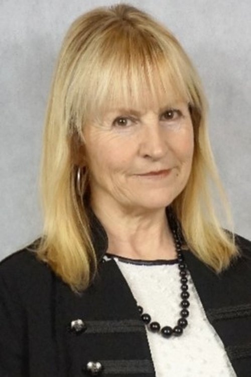 Pamela Cook as Plane Passenger