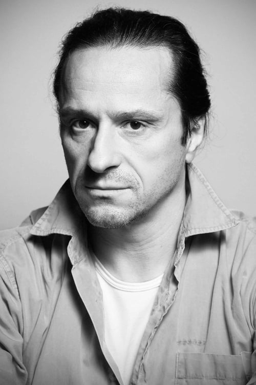 Claudiu Bleonţ as John