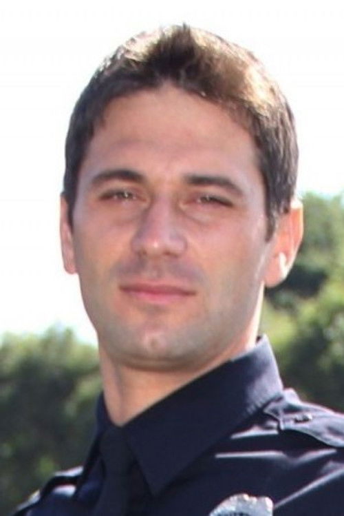 Ciprian Clipea as Police Officer