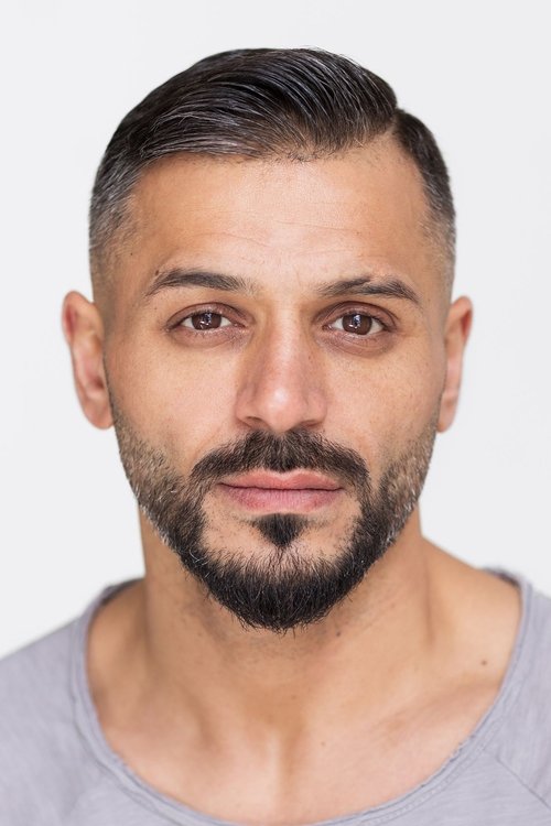 Tamer Arslan as Emre