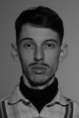 Festim Bajçinca as Police Officer