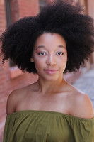 Amber Reauchean Williams as Cora