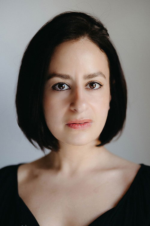 Aya Bryn Zakarya as Lamya's Mother (voice)