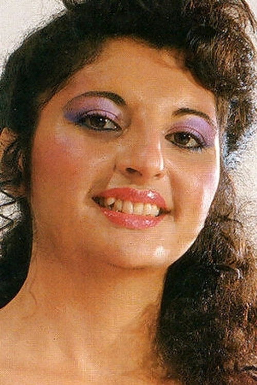 Nikki King as (archive footage)