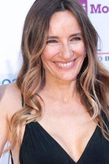 Emanuela Rossi as Doppiatrice e direttrice del doppiaggio