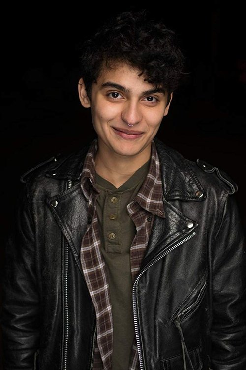 Sydney Mae Díaz as Ezra