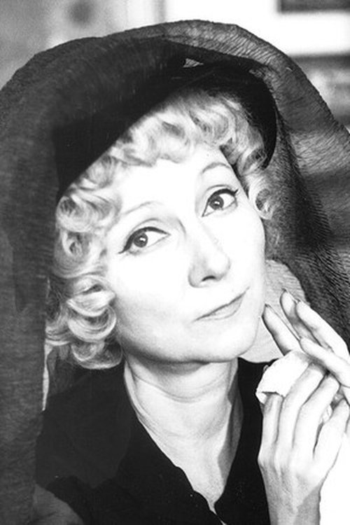 Marguerite Cassan as Mme Odile Poignant