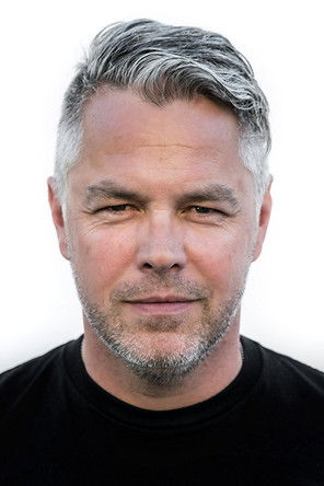 Jim Rowe as Police Photographer