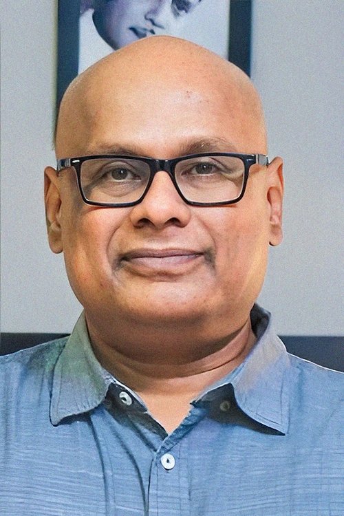 Suresh Chakravarthy as Manu's Grandfather