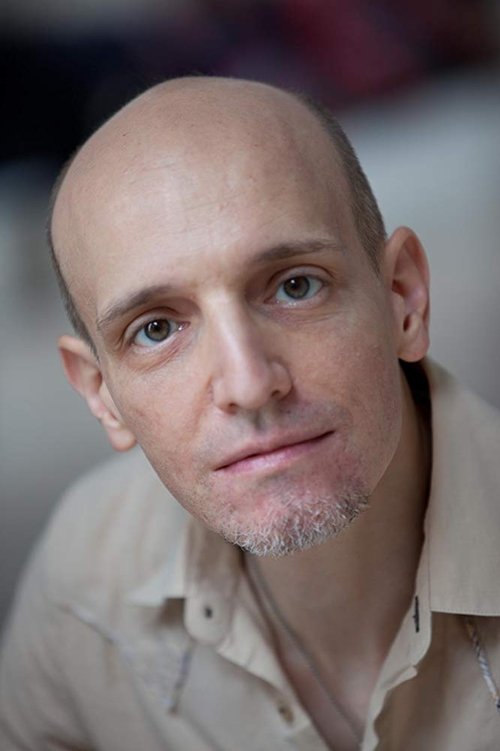 Victor La Mantia as The Homeless Man