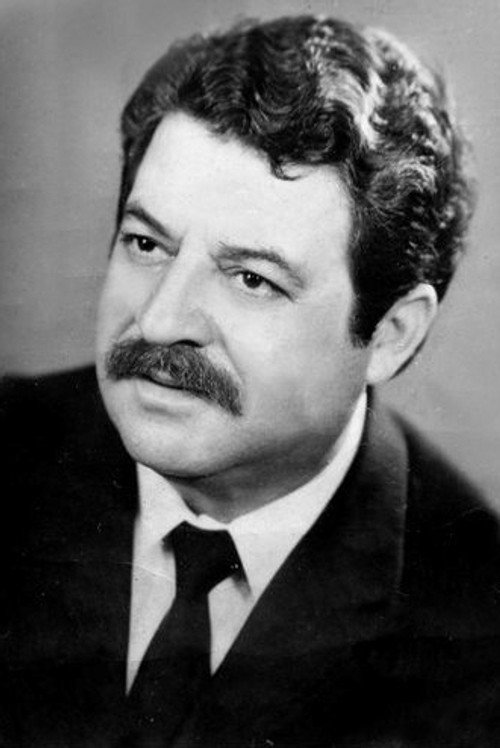 Nikolin Xhoja as Xha Beqo