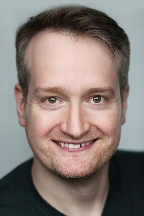 Christopher Laishley as Newscaster