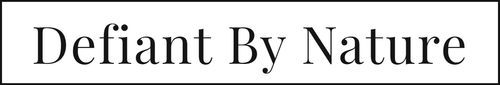 Defiant By Nature logo