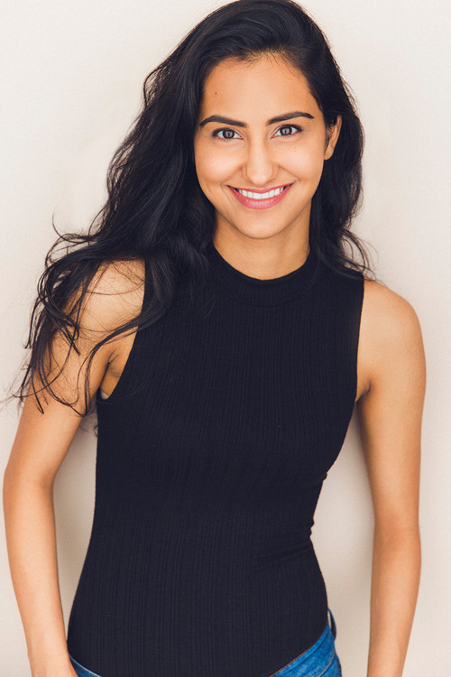 Amrit Kaur as Bela Malhotra
