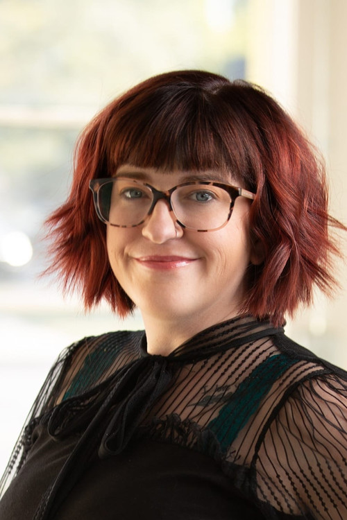 Gina Bryant as Tisha