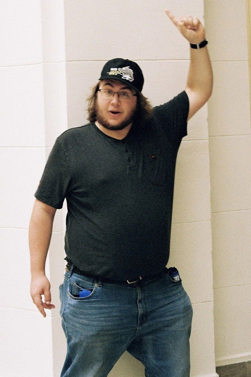 Alex Belaski as News Caster