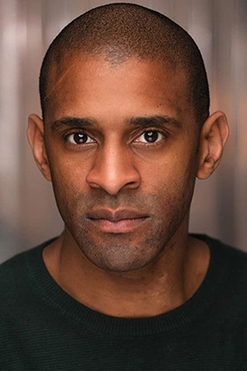 Eke Chukwu as Record Shop Assistant