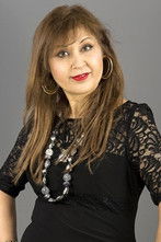 Nina Kumar as Airport Passenger