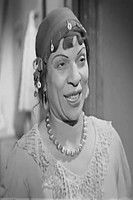Zakeya Ebrahim as زوجة المعلم خرطوشي
