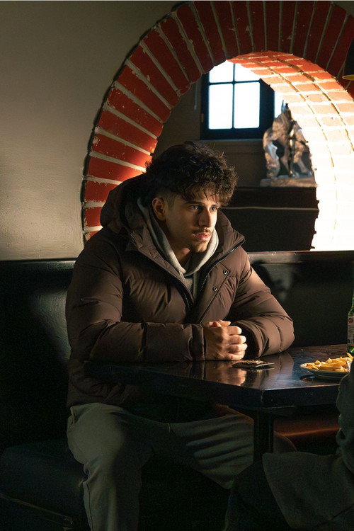 Hamzah Elzubi as Tommy Crane