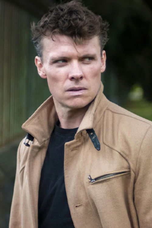 Simon Patrick Berman as John