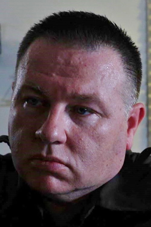 Chris Townley as The Deputy