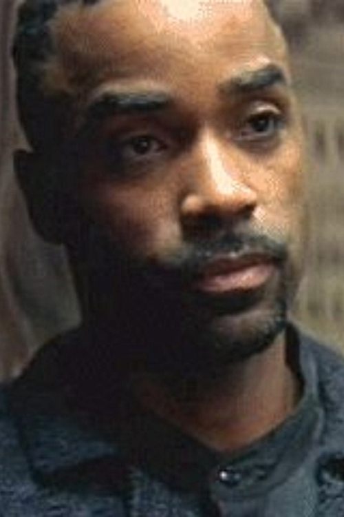 Keith Leon Williams as Kam