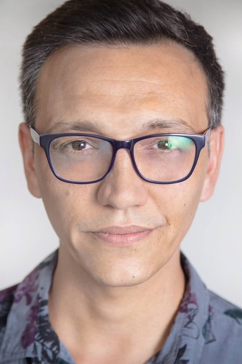 Jorge Torres as Newscaster