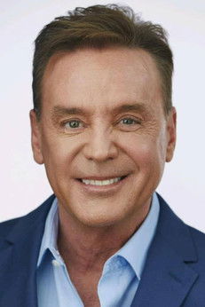 Mark Kriski as Newscaster