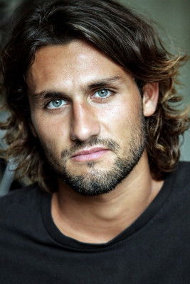 Paco Fuster as Paco, surfer boyfriend