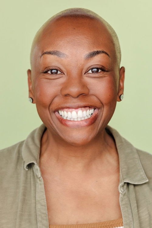 Angel Davis as Person on TV 2