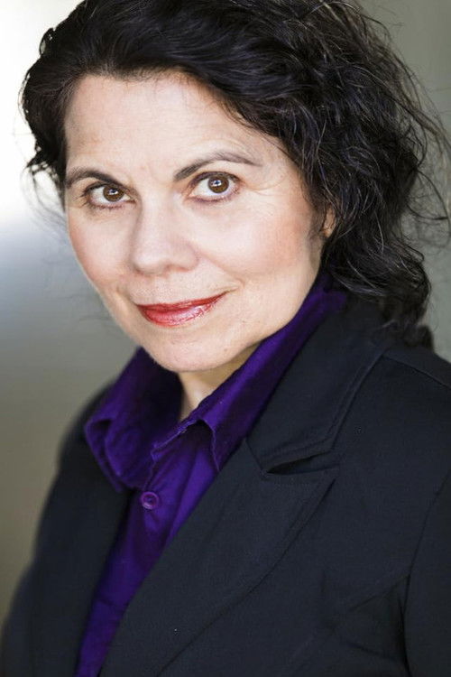 Anna Maganini as The Hostess