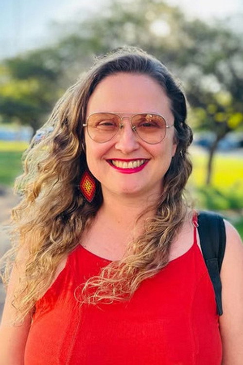 Fran Rebelatto as Interviewer (herself)