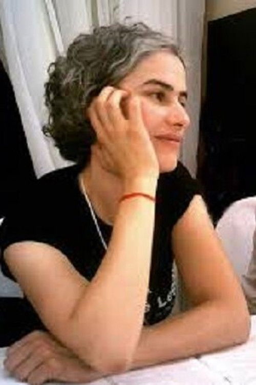 Marta Machado as Atendente do Festival / Repórter (voice)