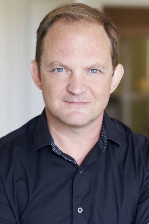 Michael Rinaldi as Office Photographer