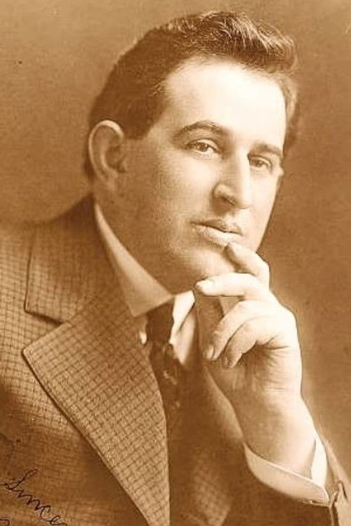 Norman Feusier as Editor Harry Jones