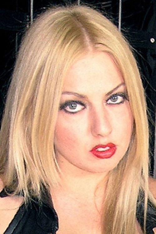 Lexi Sindel as (archive footage)