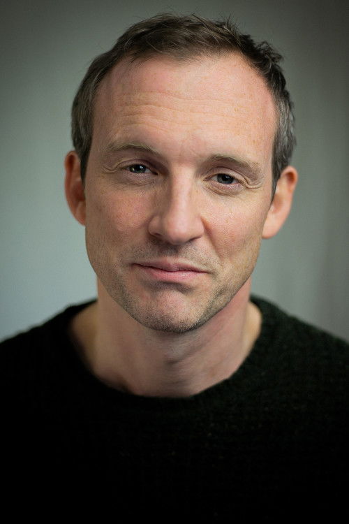 Thomas Michaelson as Man in Pub