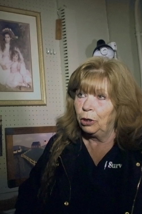 Denise Altman as Antique Shop Caretaker