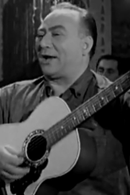 John Stakas as American man