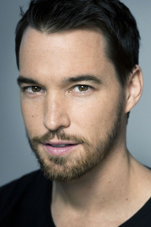 John Lyke as Blogger Greg