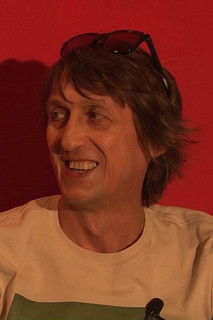 Paweł Fesołowicz as Adam Strusiński "Święty"